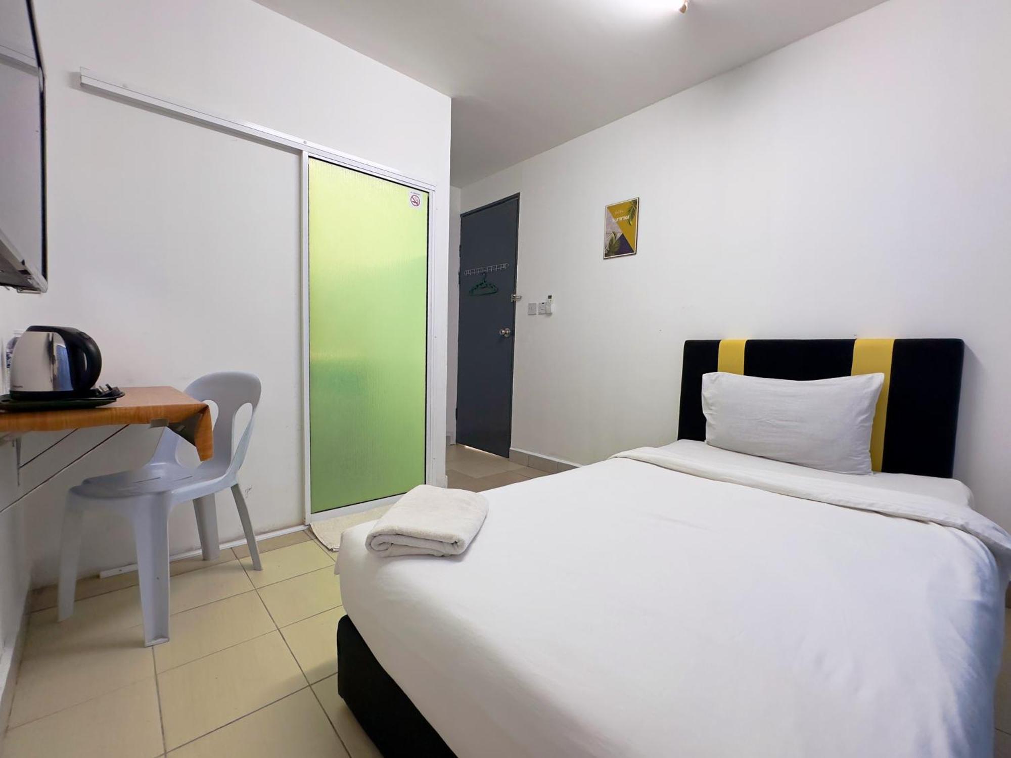 Borneo Inn Kota Kinabalu Quarto foto